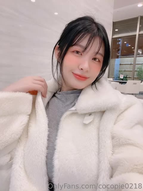 Coco Pie Fluffy White Coat Tease OnlyFans Photo Leaked
